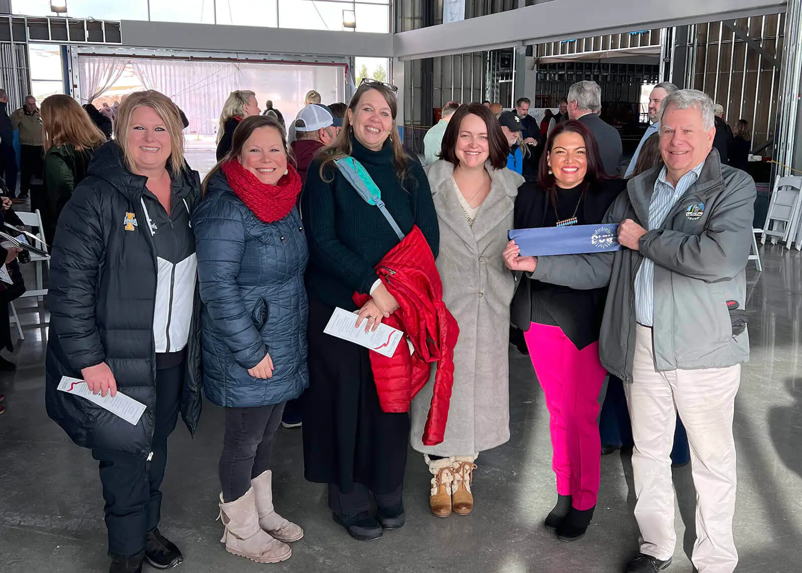 Internal Committees Group of people wearing winter coats indoors