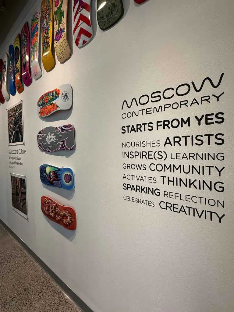Skateboard art installation and creativity quote at Moscow Contemporary